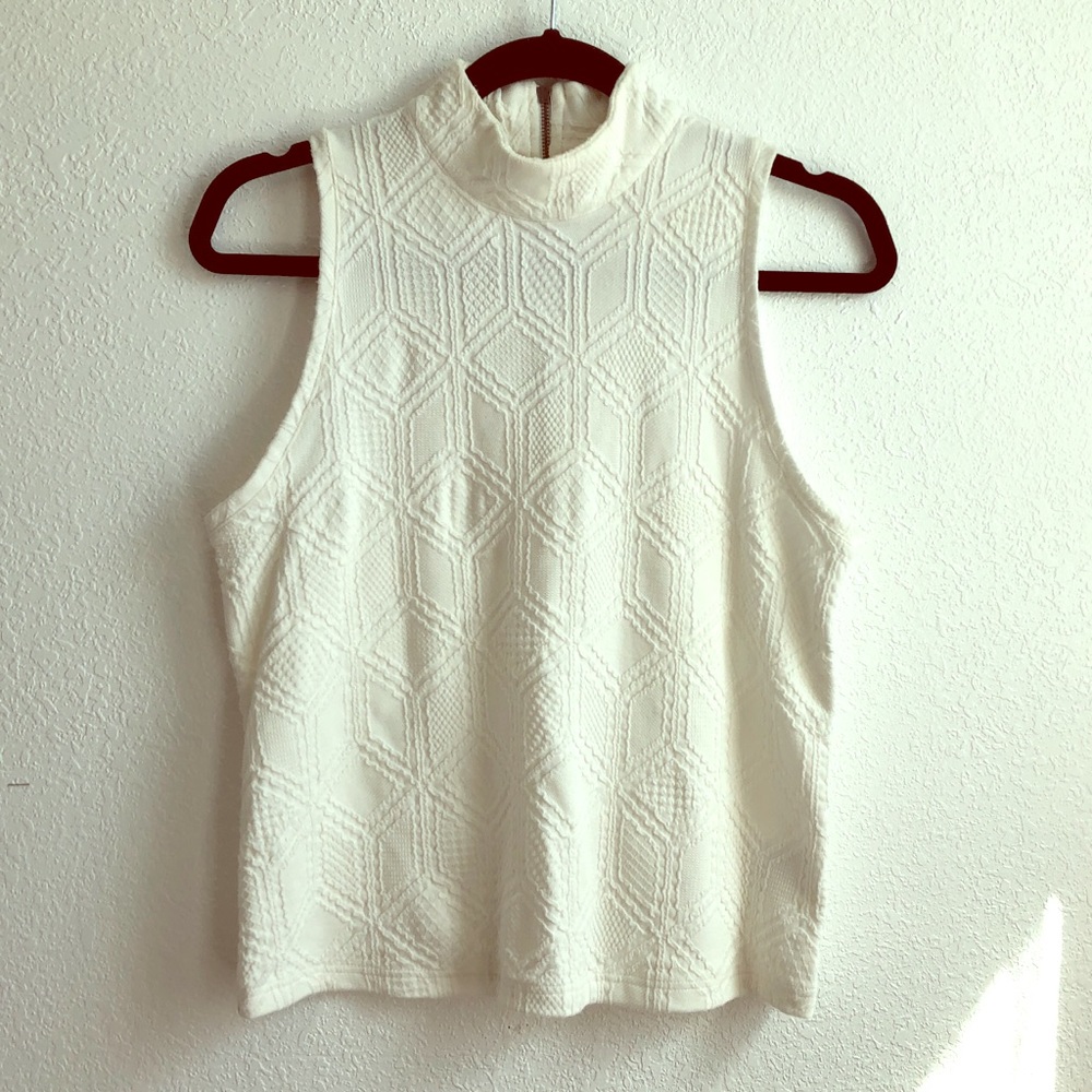 White sleeveless turtle neck anthro top